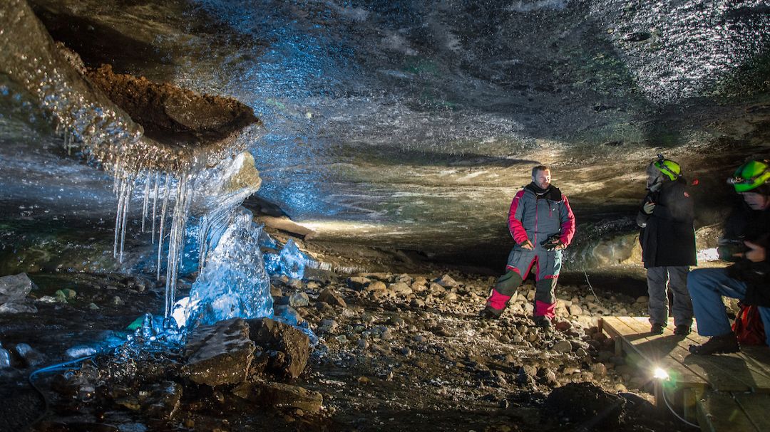 Ice Cave & Snowmobile From Gullfoss